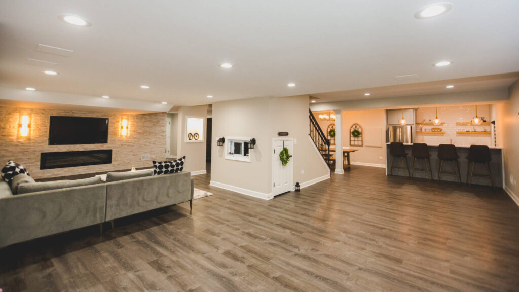 beautiful finished basement with media area and bar